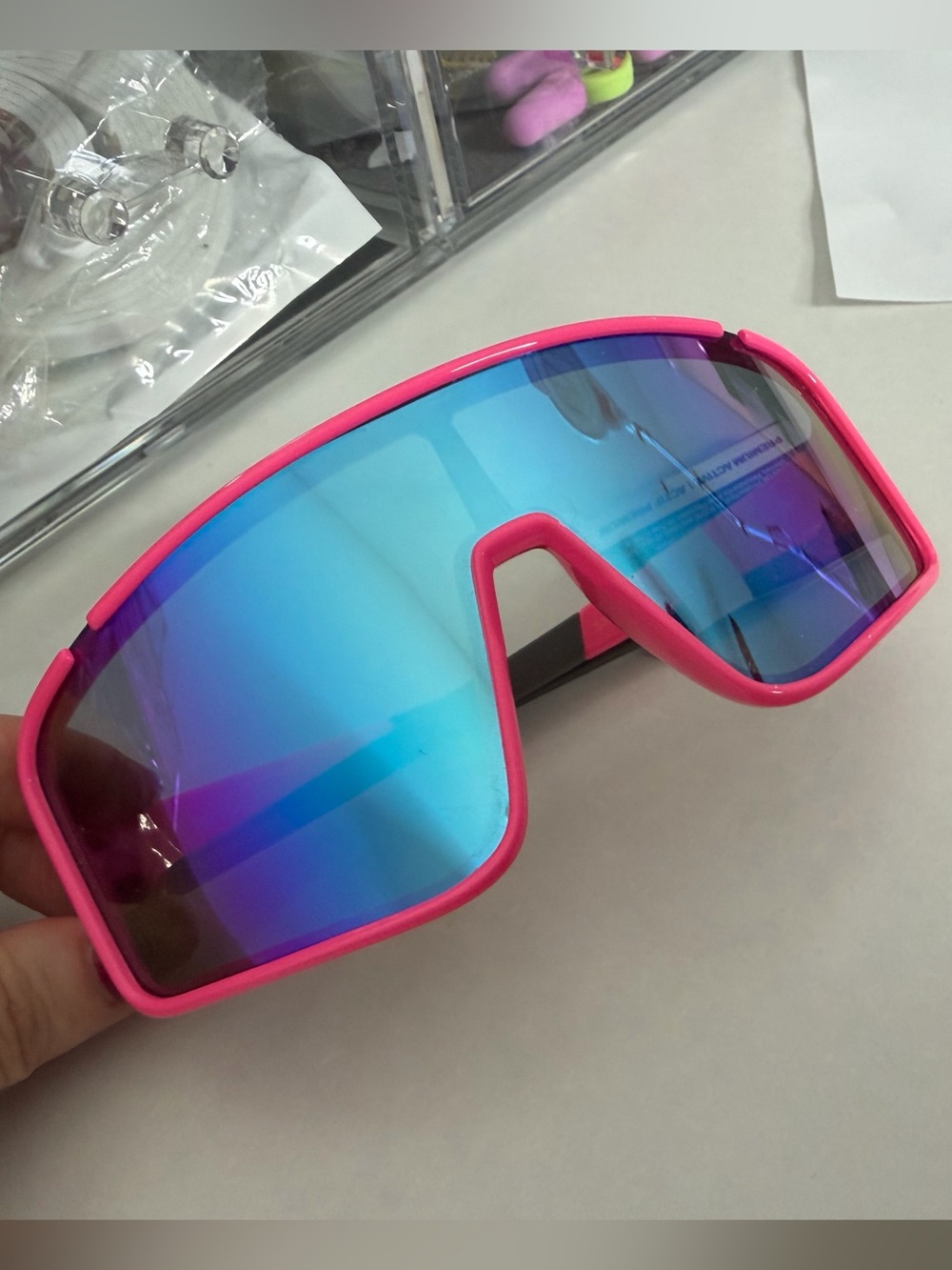 Rawlings Pink Frame Blue Mirrored
Lens Sports Sunglasses
